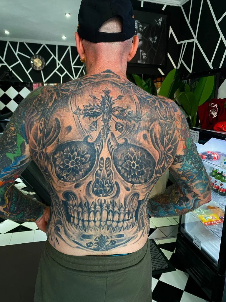 Black and Grey Sugar Skull Back Piece Studio View — Black & Grey tattoo at Bali Family Tattoo Studio, Bali