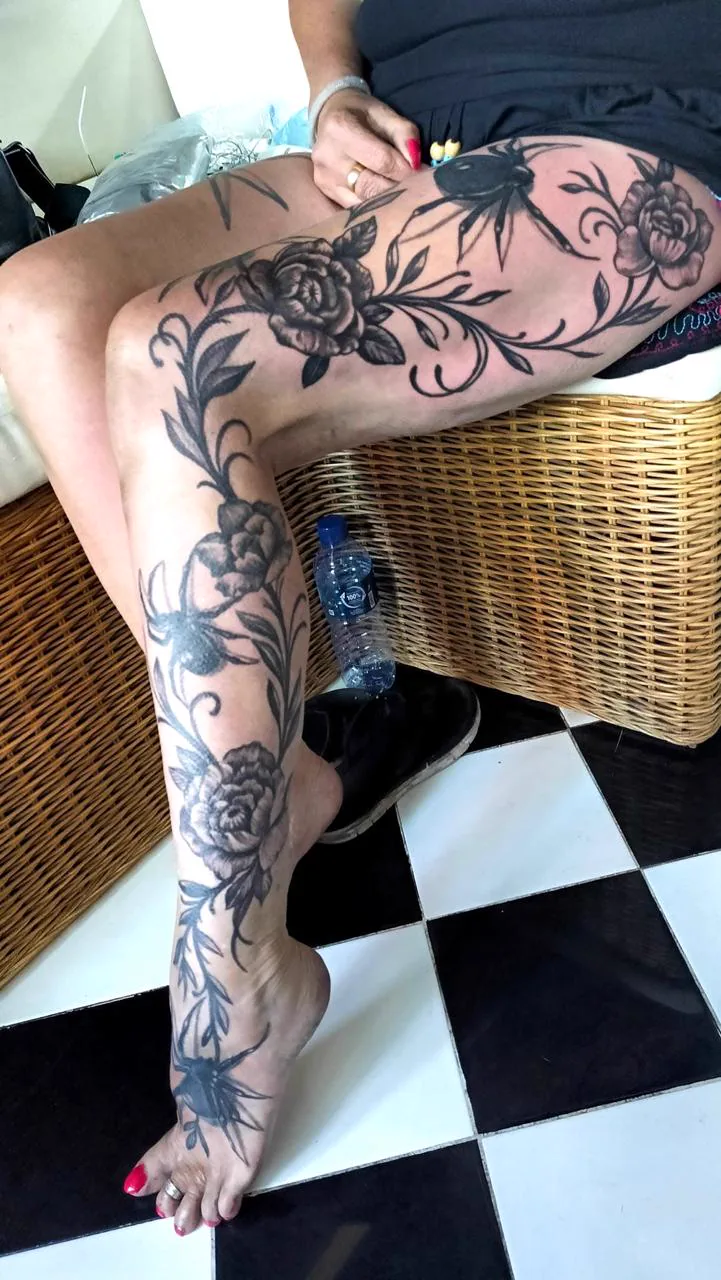 Blackwork Rose and Vine Full Leg Tattoo, Fine Line tattoo at Bali Family Tattoo Studio, Bali