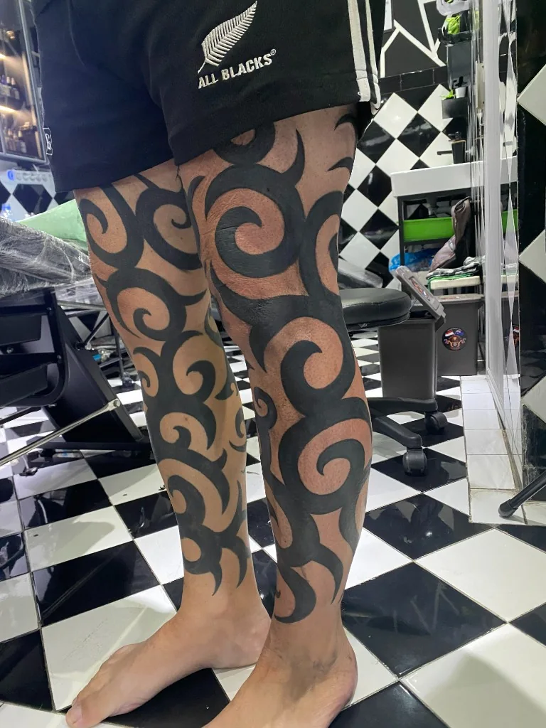 Bold Tribal Leg Sleeves Tattoo — Tribal tattoo at Bali Family Tattoo Studio, Bali
