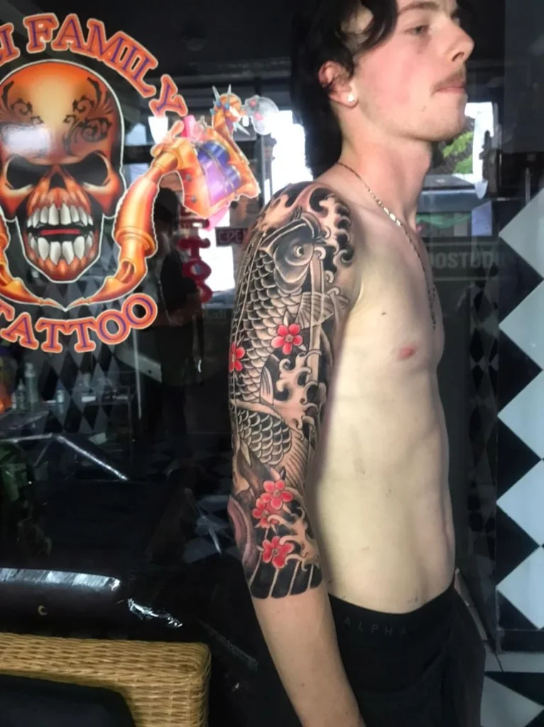 Japanese Koi Half Sleeve Tattoo — Japanese Traditional tattoo at Bali Family Tattoo Studio, Bali