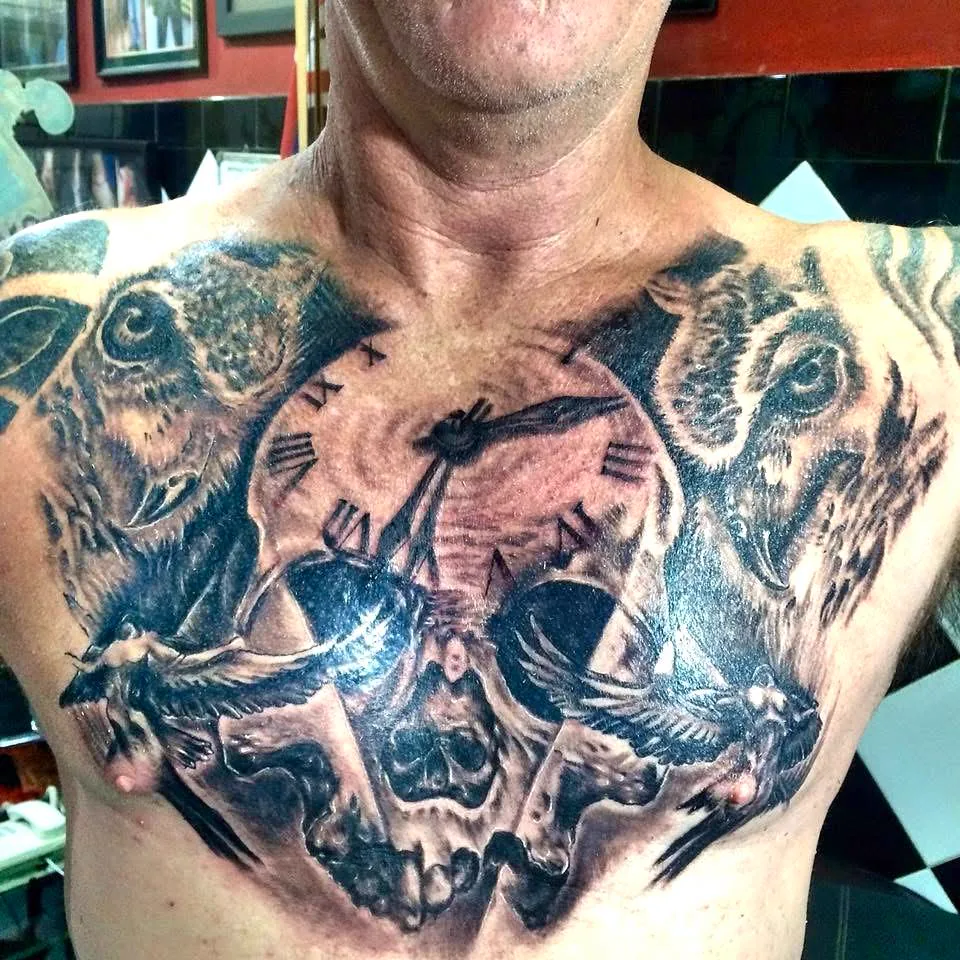 Skull Owls and Clock Chest Tattoo, Black & Grey tattoo at Bali Family Tattoo Studio, Bali